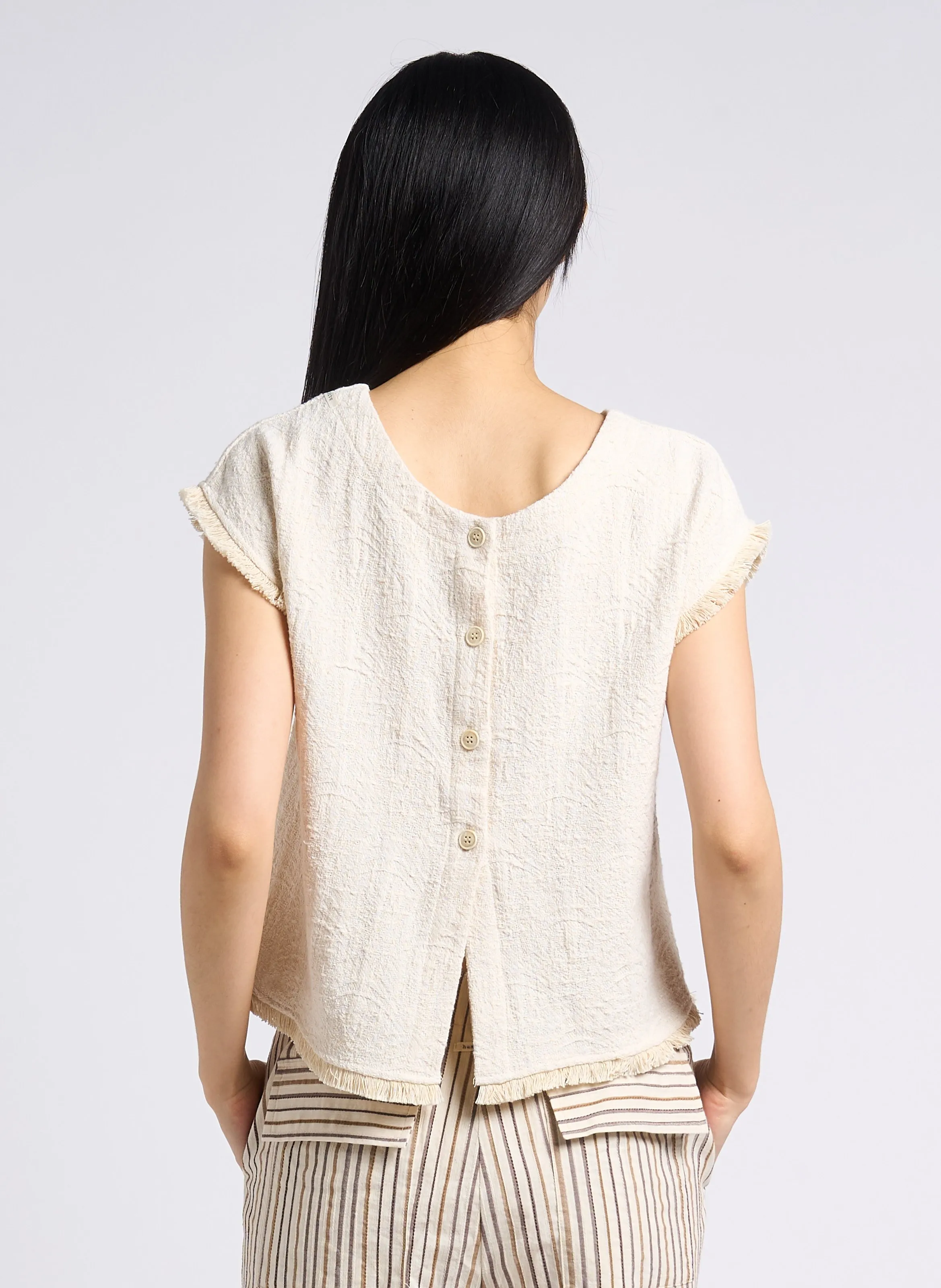 HUMILITY Top holgado de jacquard con flecos y cuello redondo en blanco