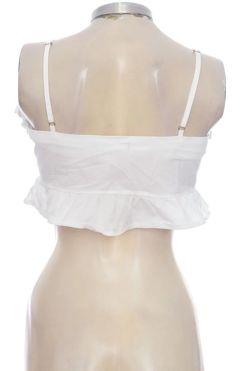 TOP / CAMISETA COLOR BLANCO  STUDIO F